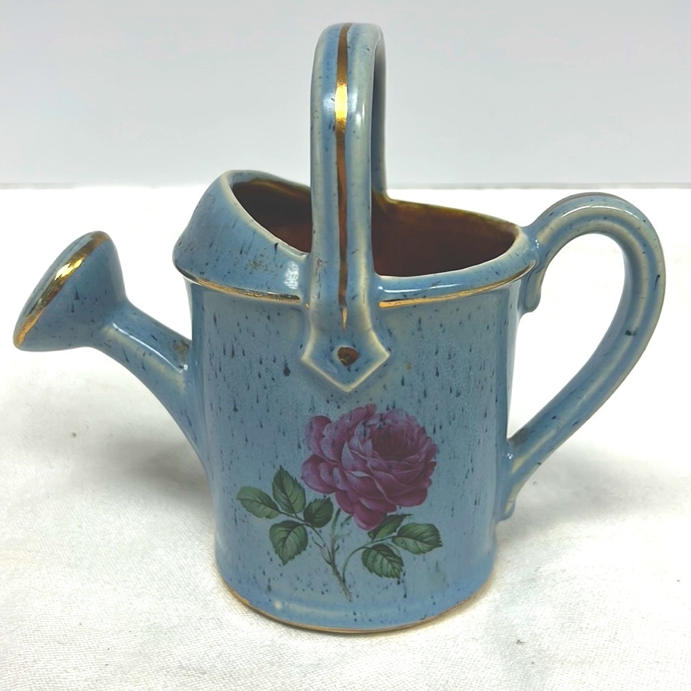 Vintage “McCoy” pottery USA small glazed watering can with cabbage rise design